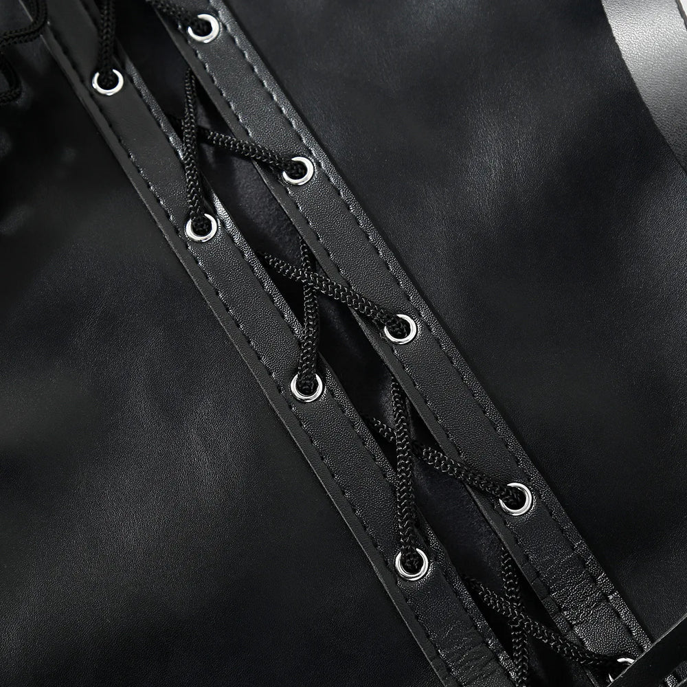 Close-up of black bondage restraint bag with crisscross lacing and silver eyelets