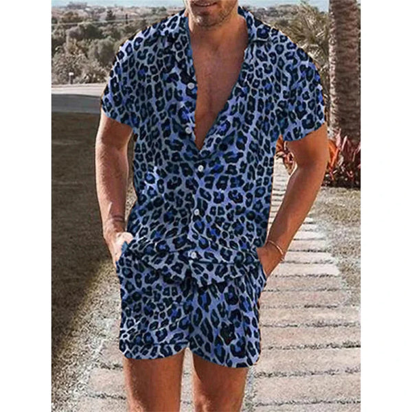 Model wearing a blue leopard-print short-sleeve shirt and matching shorts outdoors