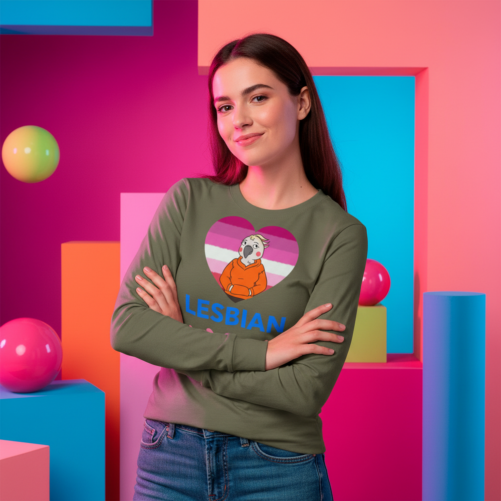 person modeling an olive long-sleeve shirt with a lesbian pride heart and cockatiel graphic