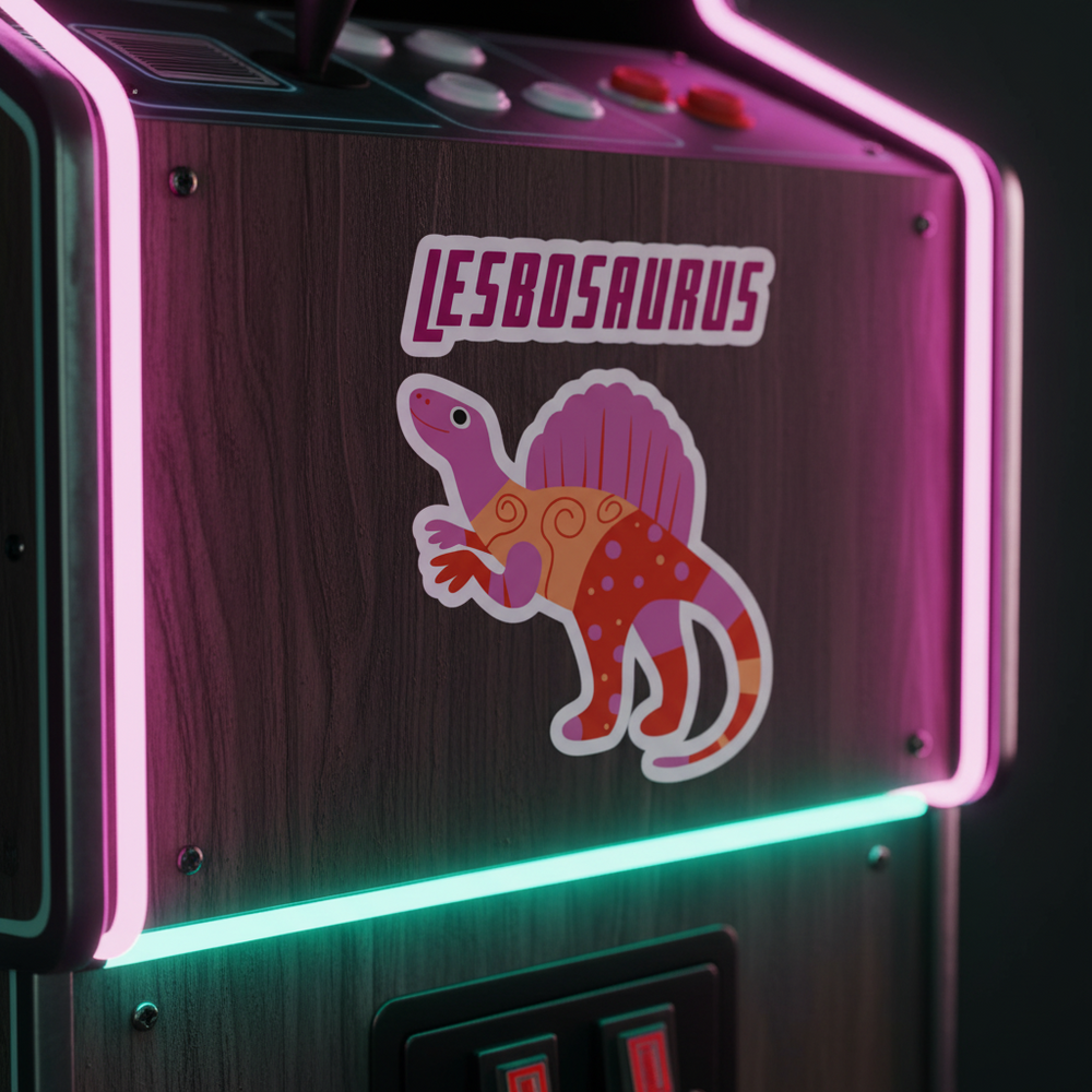 Lesbosaurus Bubble-Free Sticker pops on a retro arcade machine with wood grain