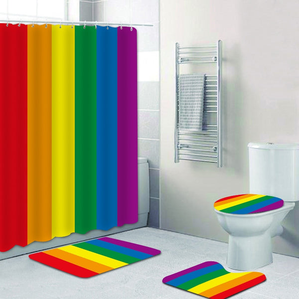 Rainbow-striped shower curtain with matching bath mat, toilet lid cover, and floor mat