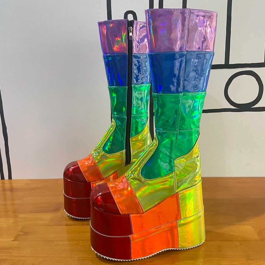 Pair of rainbow holographic platform boots shown at a three-quarter angle