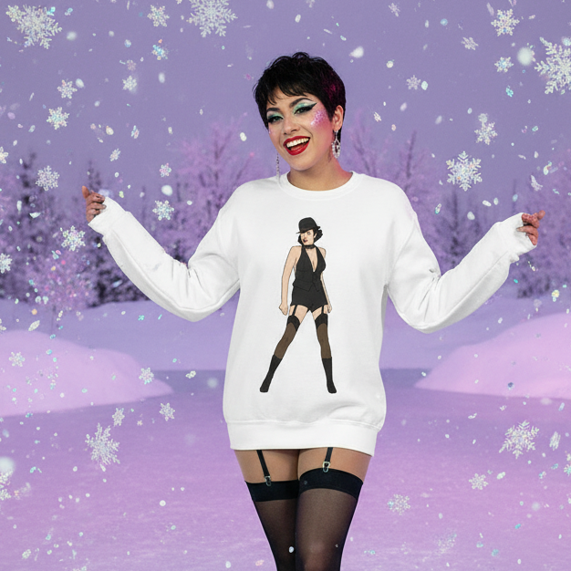 Person wearing a white sweatshirt with a black dancer illustration in a snowy purple scene