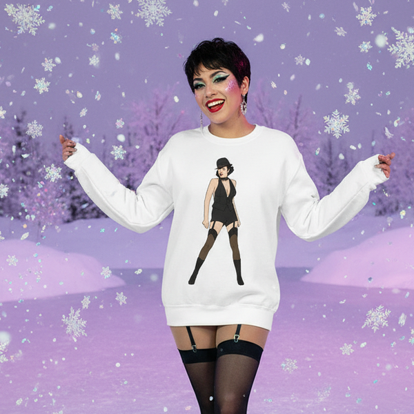 Person wearing a white sweatshirt with a black dancer illustration in a snowy purple scene