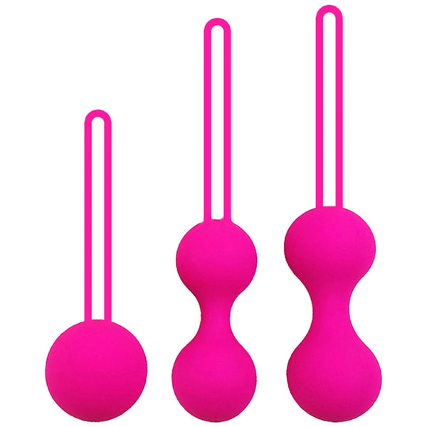 Three bright pink vaginal trainer weights with loop handles in graduated sizes
