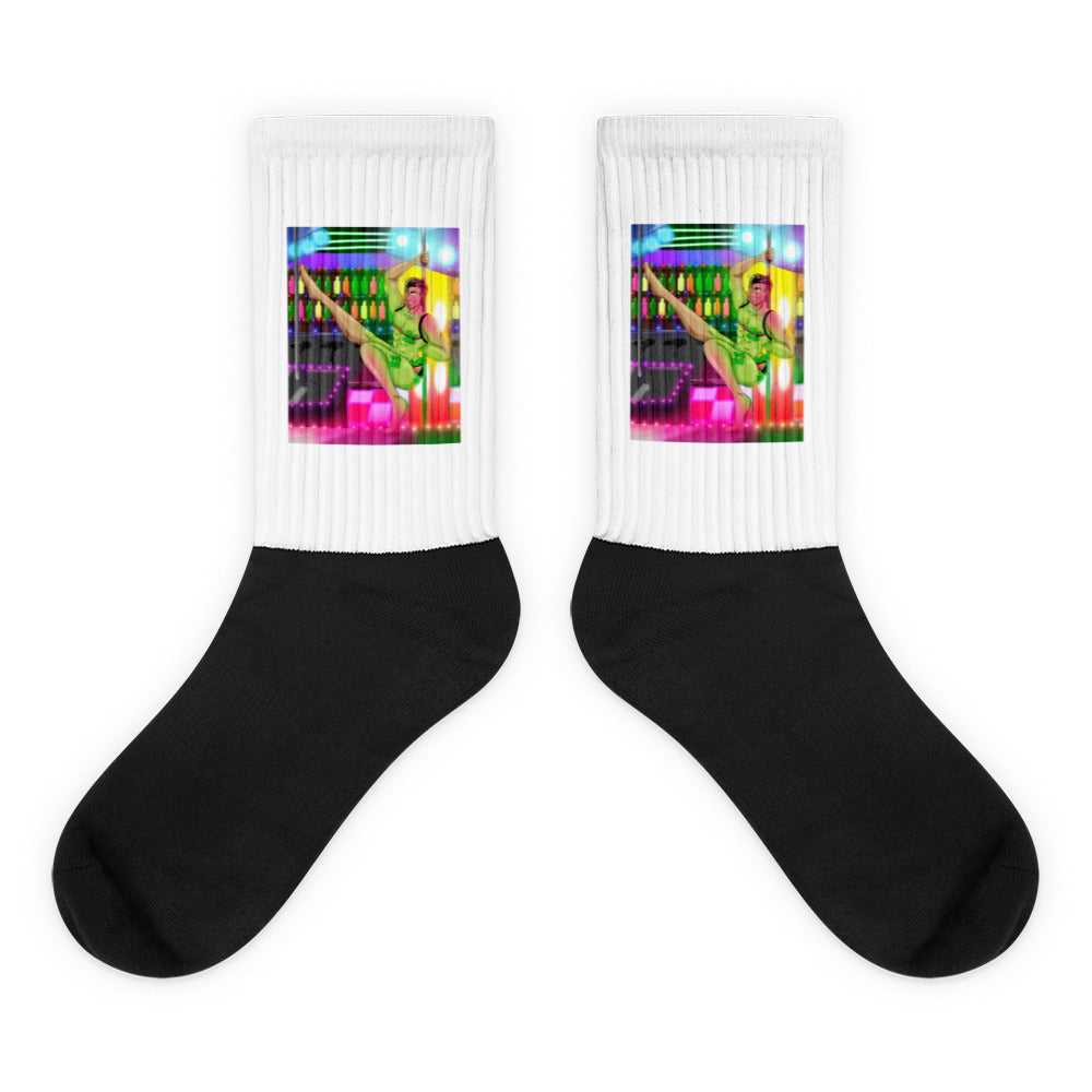 Love At A Gay Gogo Bar Socks feature a black foot and white leg with vibrant neon art of a dancer