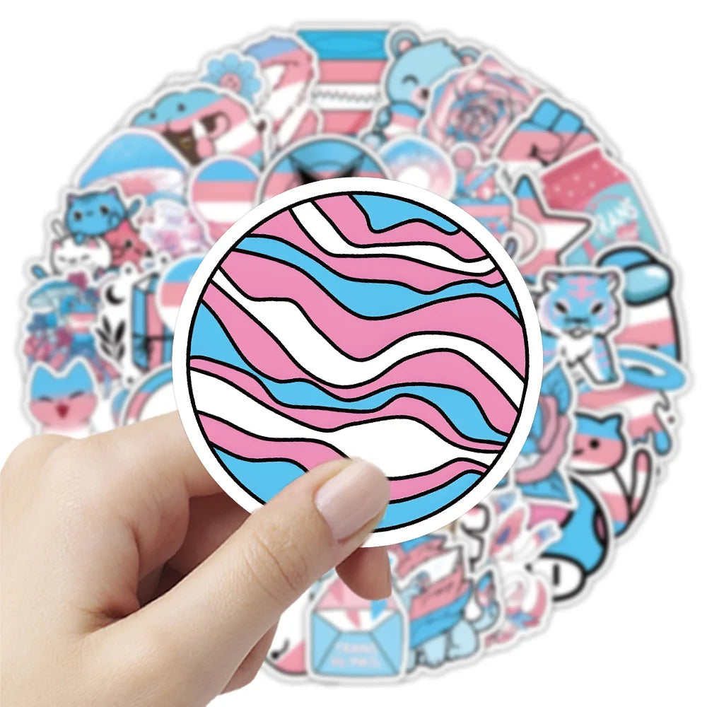 Hand holding a round transgender pride sticker with wavy pink, blue, and white stripes
