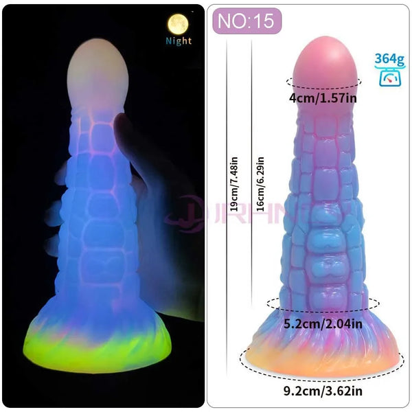 Glow-in-the-dark fantasy silicone dildo shown upright, with segmented shaft and wide flared base