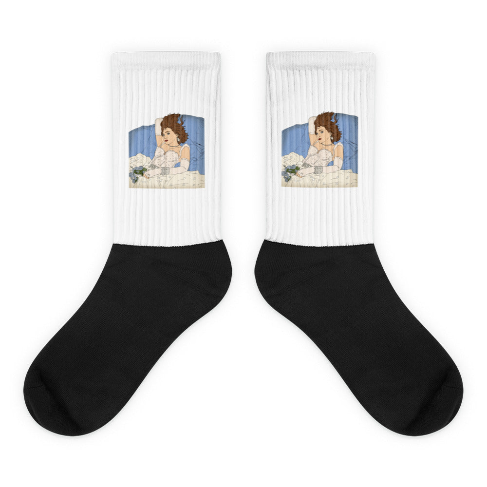 Pair of white ribbed socks with bridal illustrations and black foot sections