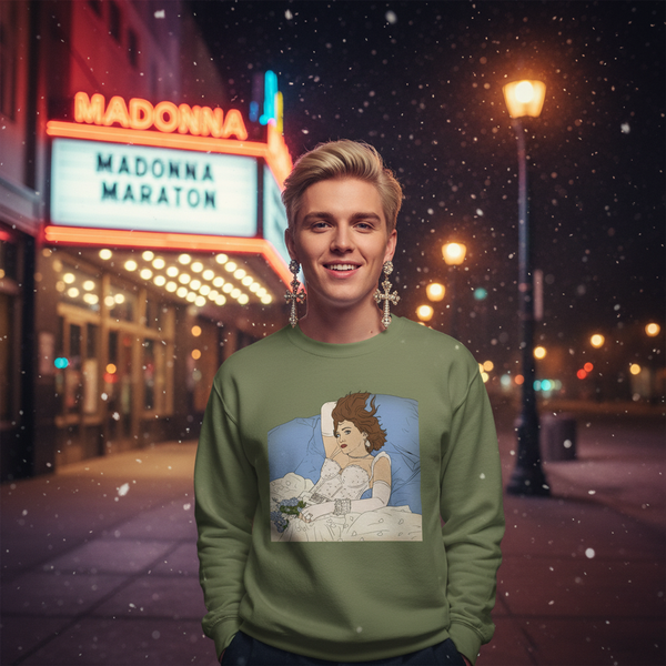 Smiling model in a green sweatshirt with a reclining bride illustration, on a snowy city street
