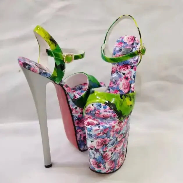Pair of floral-print platform heels with lime-green ankle straps and towering white heels