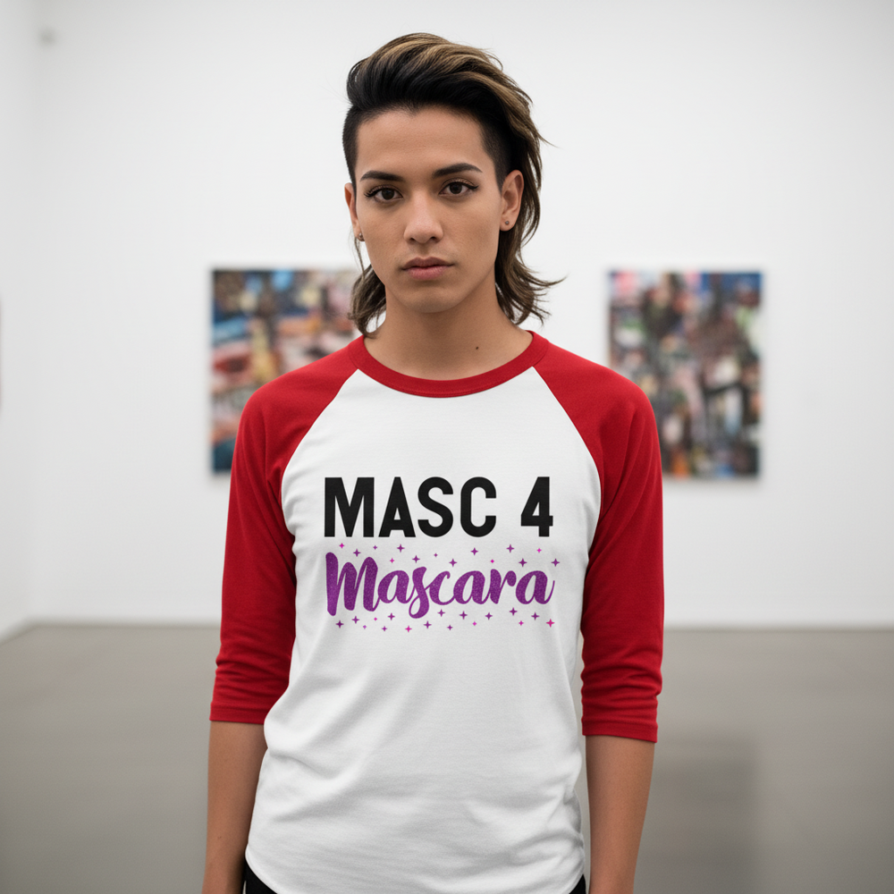 Masc 4 Mascara 3/4 sleeve raglan shirt with bold black and purple lettering; queer person stands in gallery, facing camera.
