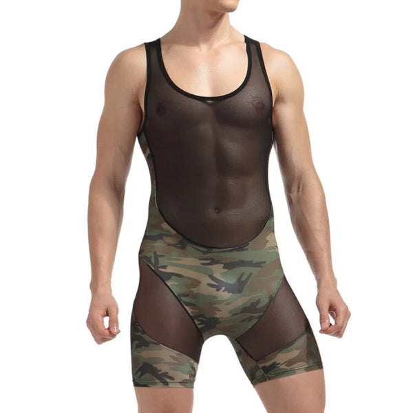 Front view of a person wearing a black mesh bodysuit with camouflage briefs and thigh panels