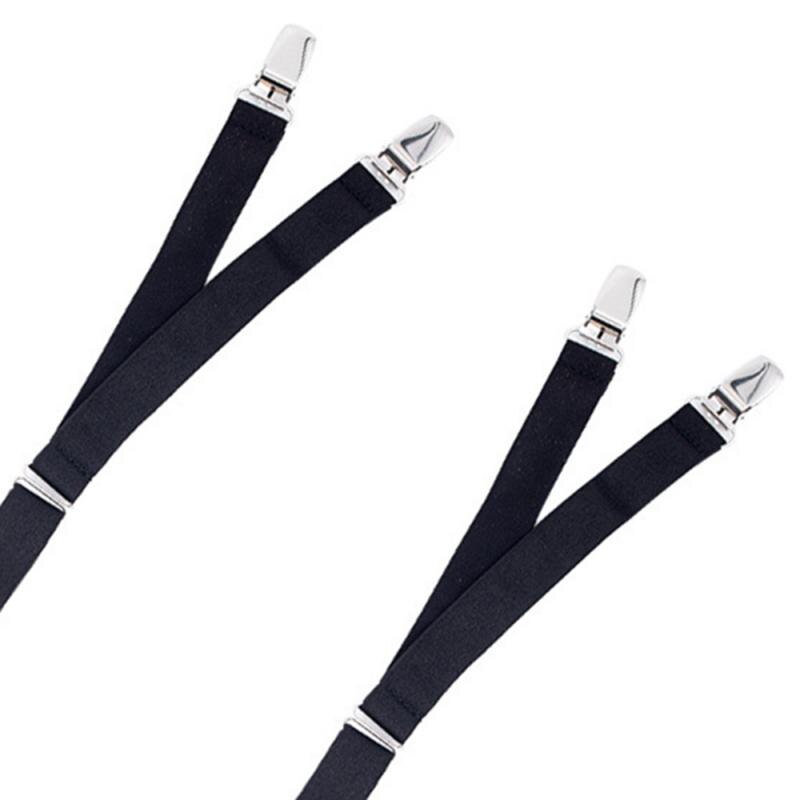 Flat lay of four black elastic garter straps with silver metal clips on a white background