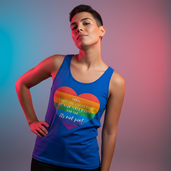 Front view of a person wearing a blue tank top with a rainbow heart and “It’s not pie!”