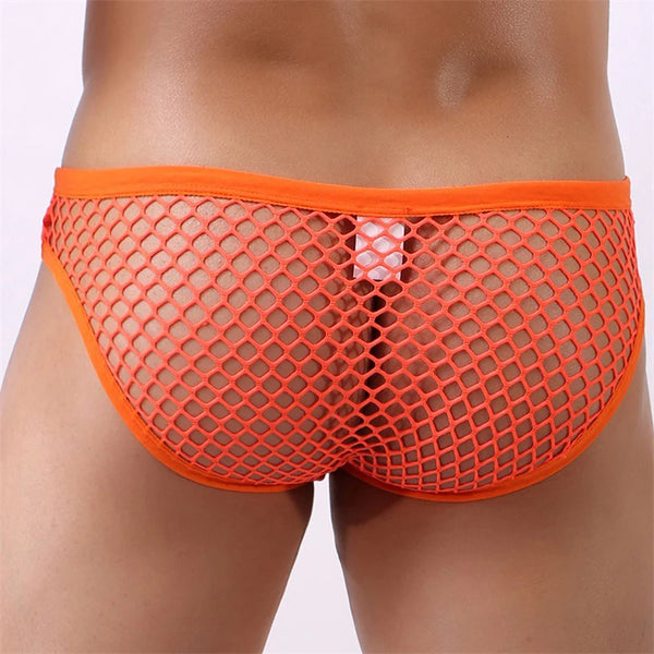 Rear close-up of a model wearing bright orange diamond-mesh low-rise briefs