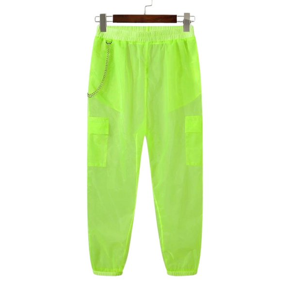 Front view of neon-green sheer joggers hanging from a clip hanger, with cargo pockets and a chain