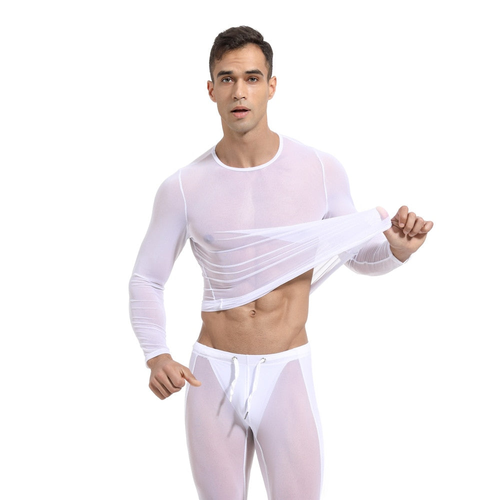 Model lifting a sheer white long-sleeve mesh shirt to reveal their torso