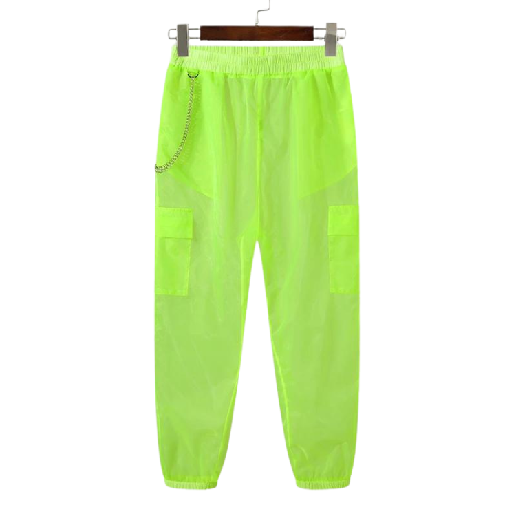 Front view of neon-green sheer joggers hanging from a clip hanger, with cargo pockets and a chain