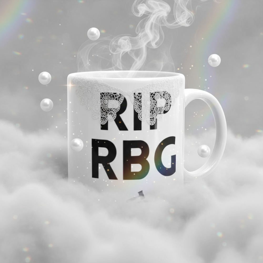 White RIP RBG mug with black lettering, lace overlay, steam, bubbles, and rainbow light