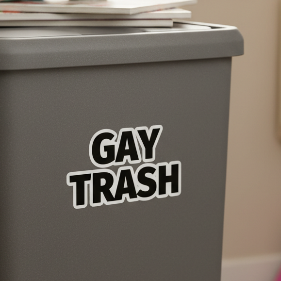 Vinyl Gay Trash Bubble-Free Stickers on a green dumpster, with bold black-and-white "GAY TRASH" text, set outdoors by an alley.
