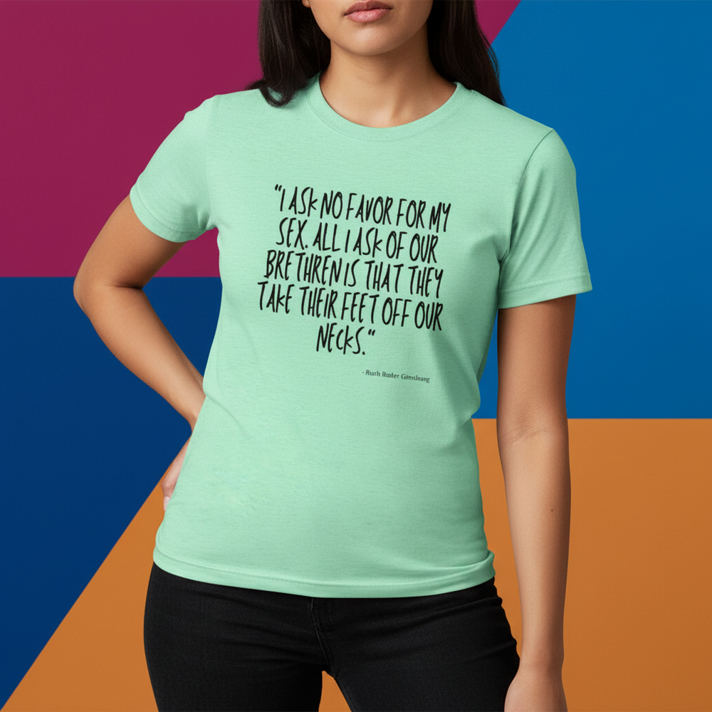Mint green T-shirt worn by a model, printed with a Ruth Brant Gilmour quote about sex and feet