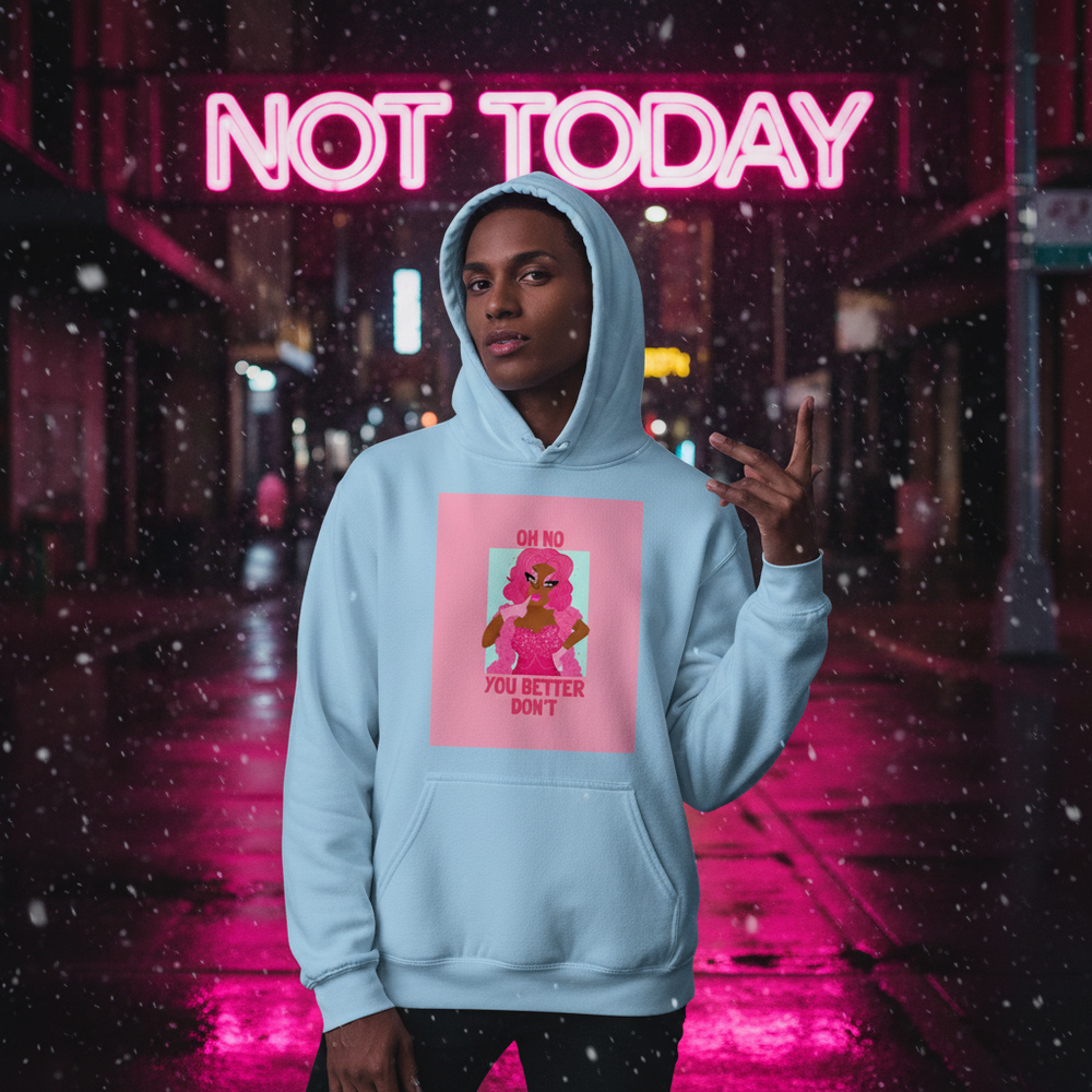 Model wearing a light blue hoodie with pink “OH NO YOU BETTER DON'T” graphic