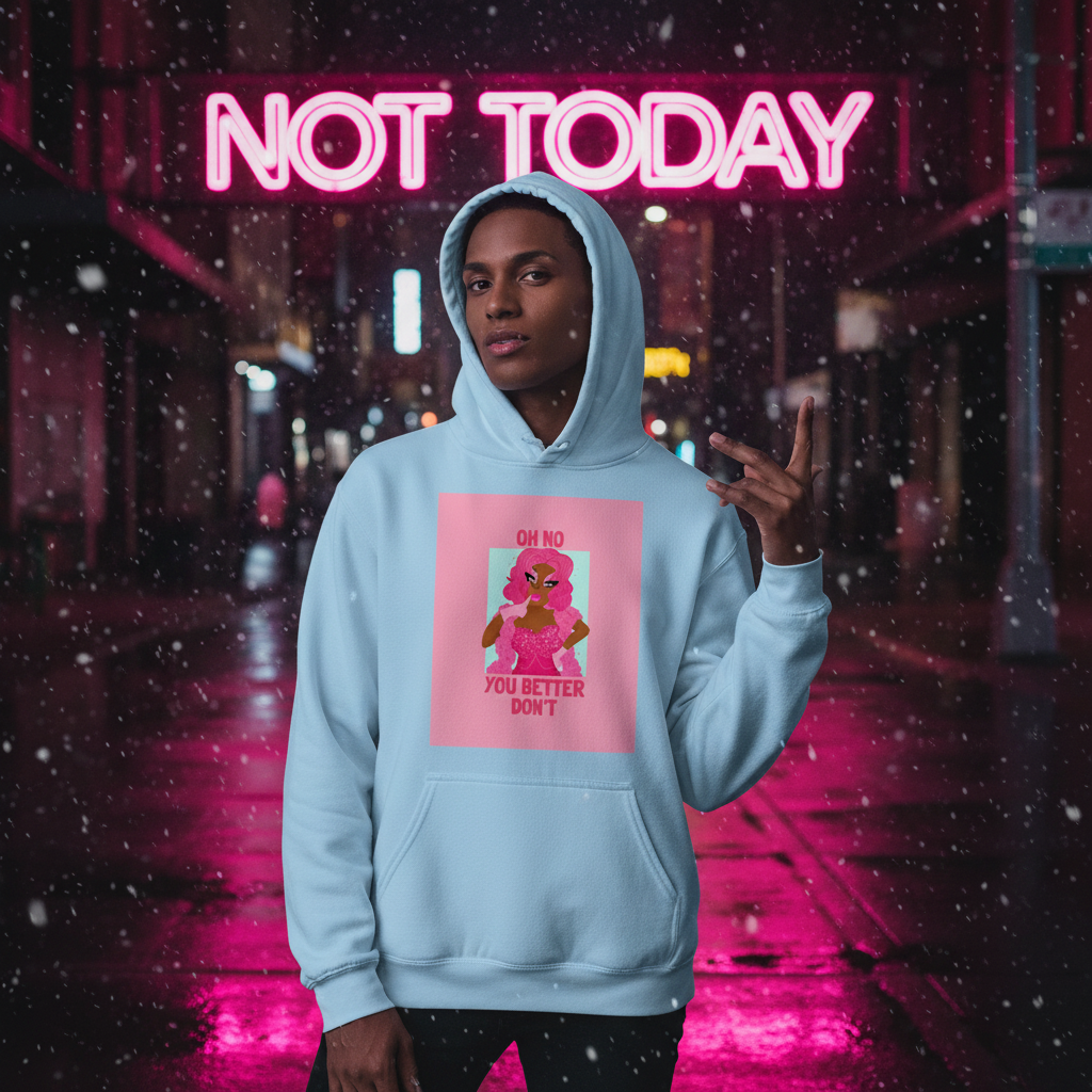 Model wearing a light blue hoodie with pink “OH NO YOU BETTER DON'T” graphic