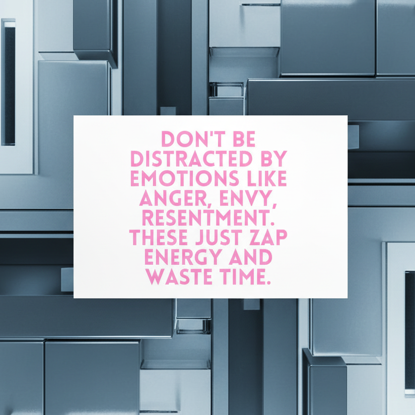 Close-up of a white postcard with pink text about not being distracted by emotions