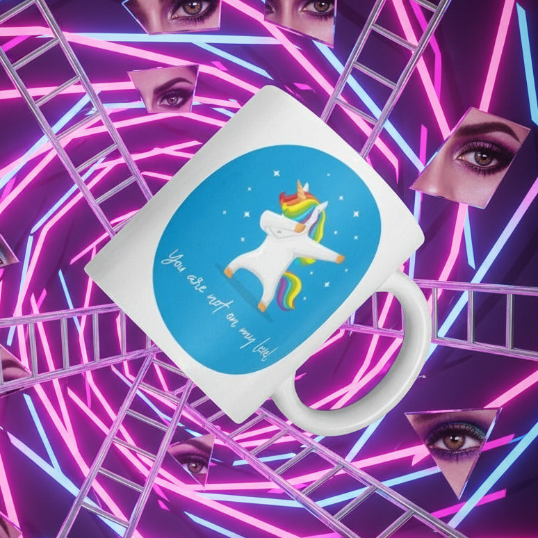 White mug with a rainbow-maned unicorn and “You are not on my level” slogan