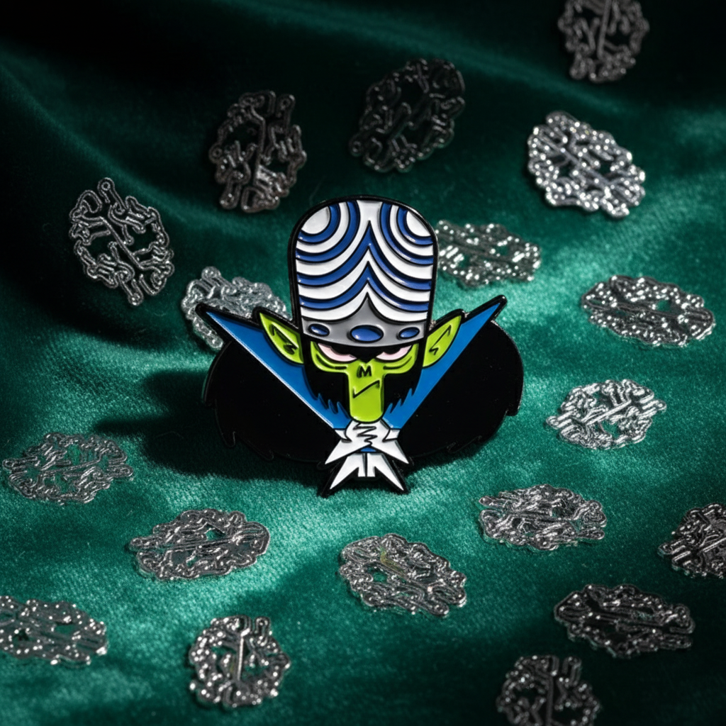 Enamel pin featuring Mojo Jojo in a blue-and-white striped hat on green fabric