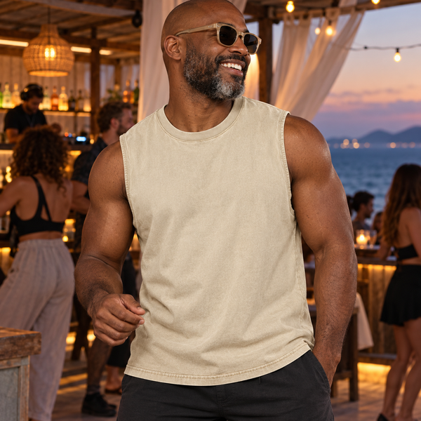Muscle Washed Cotton Tank Top in beige, worn by a muscular man with coordinated sunglasses at a club.