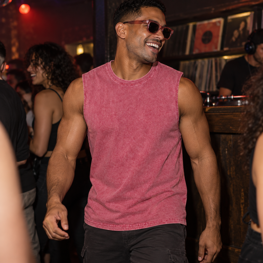 Muscle Washed Cotton Tank Top in pink, worn by a muscular man with coordinated sunglasses at a club.