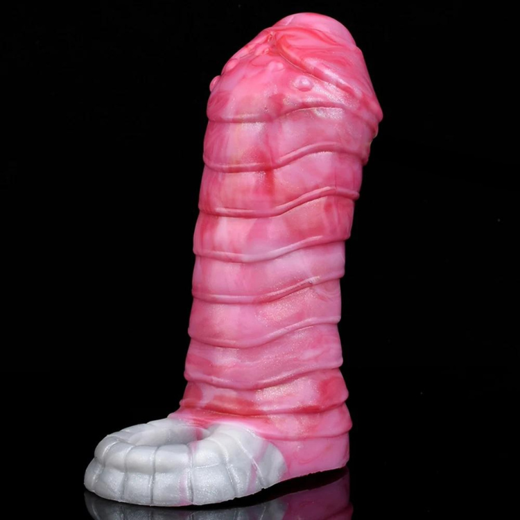 Pink penis extension with raised spiral ridges and a segmented white base on black