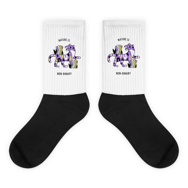 Pair of black-and-white socks with purple big-cat graphics and “NATURE IS NON-BINARY” text