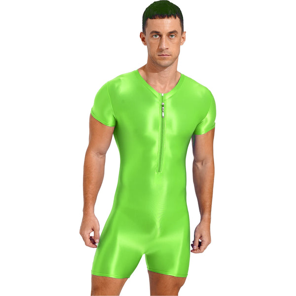 Front-facing model wearing a glossy neon-green short-sleeve bodysuit with a chest zipper