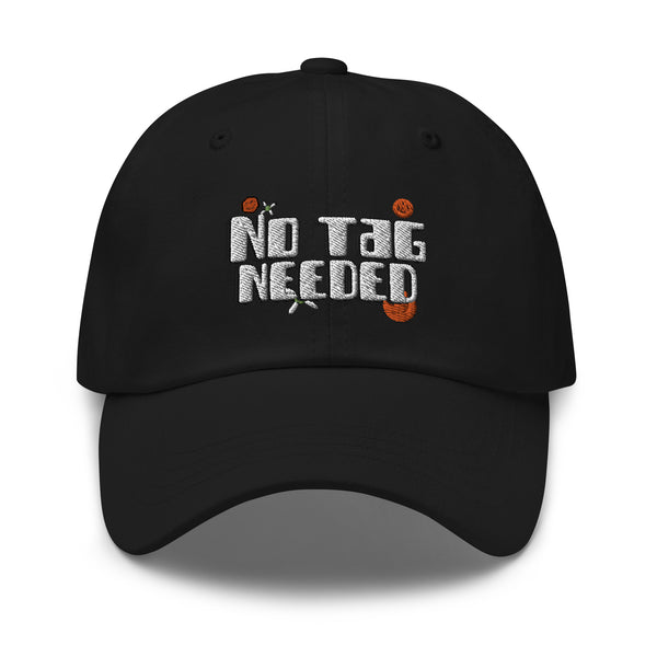 Front view of a black cap embroidered with “NO TAG NEEDED” in white and orange