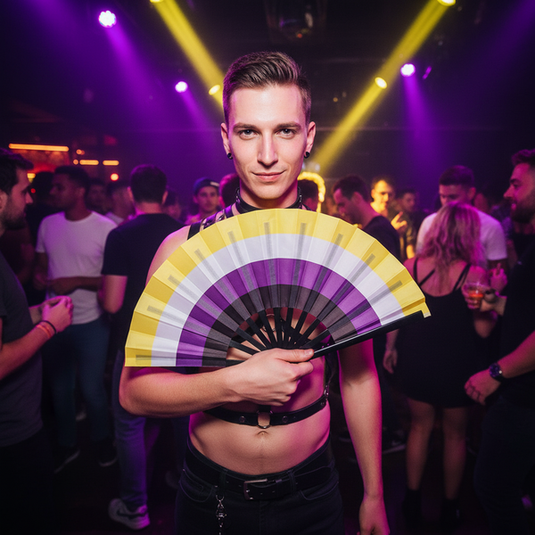 Person in a black leather harness holds an open yellow, white, purple, and black folding fan at a nightclub
