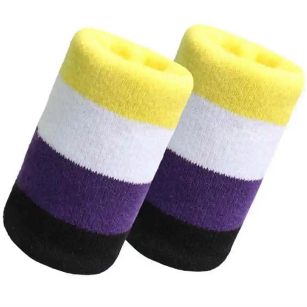 Pair of non-binary pride wrist sweatbands with yellow, white, purple, and black stripes