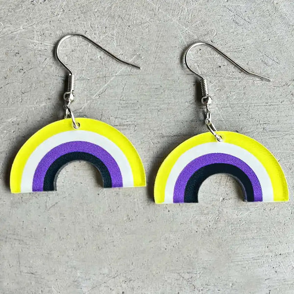 Pair of acrylic rainbow arch dangle earrings in yellow, white, purple, and black