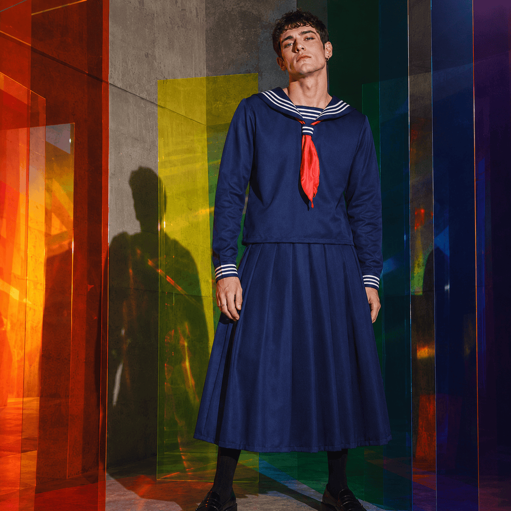Model wearing a navy Japanese sailor school uniform costume with red neckerchief