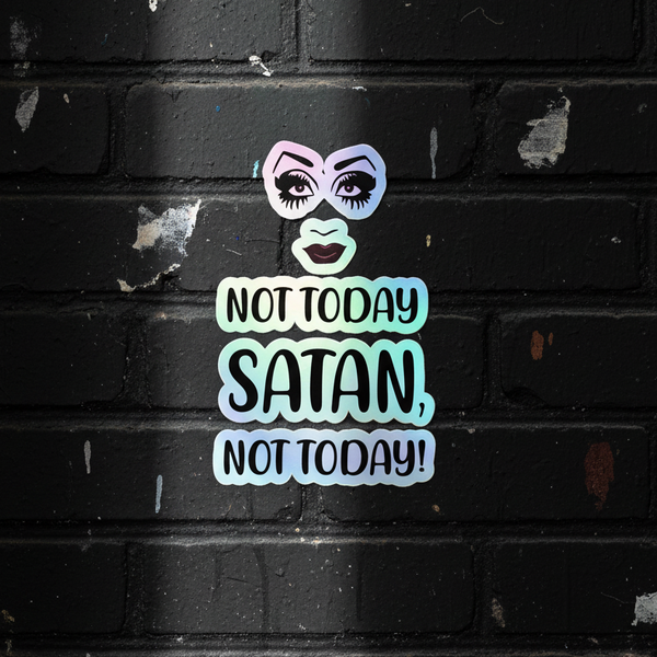 Holographic sticker with stylized eyes and lips, bold “NOT TODAY SATAN, NOT TODAY!” text on a black brick wall