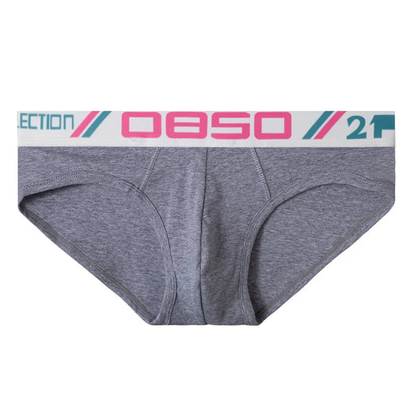 Gray brief underwear with a white waistband featuring pink and teal geometric branding
