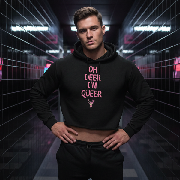 Model wearing a black cropped hoodie reading “OH DEER I’M QUEER”