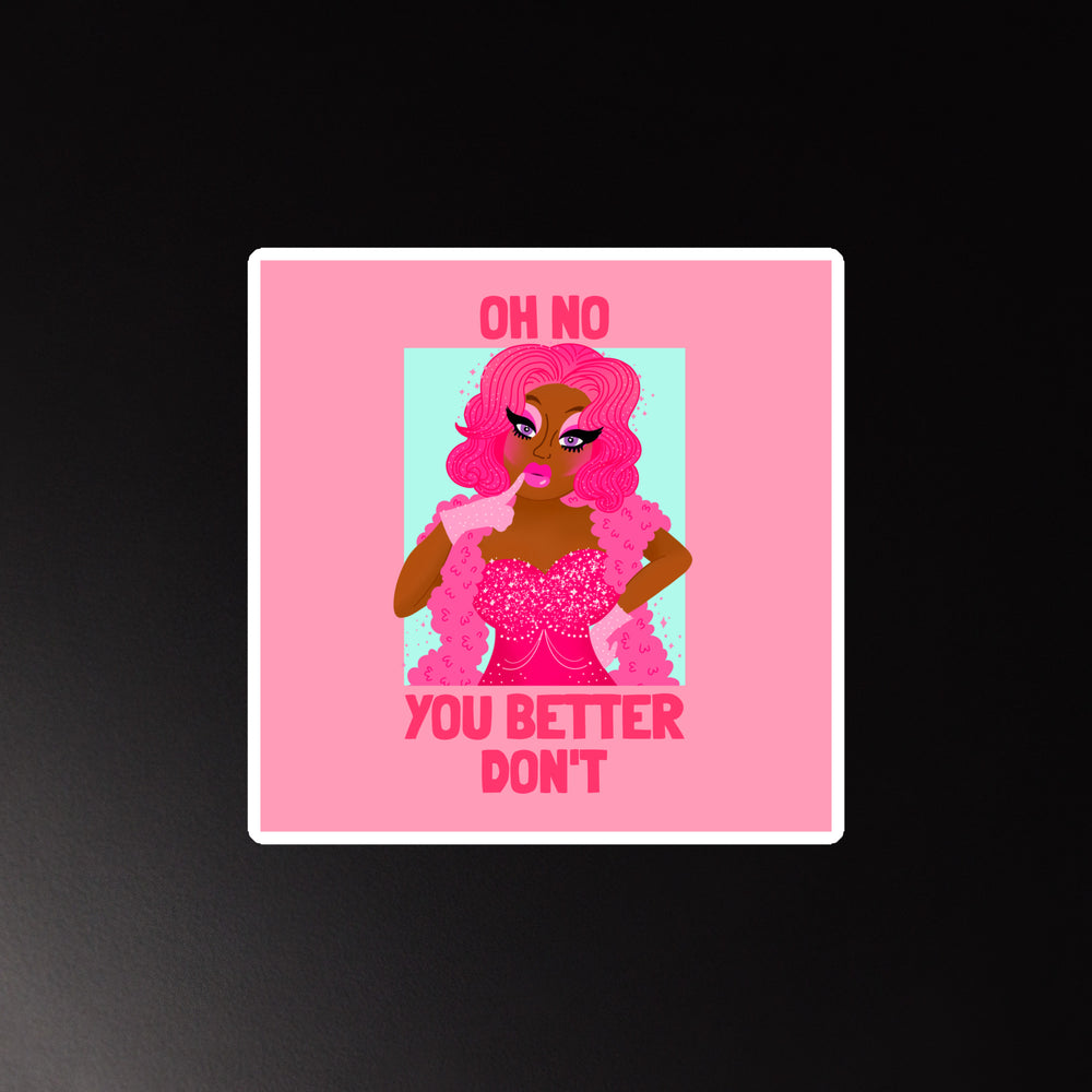 Rectangular magnet with a fierce illustrated drag queen—pink hair, glitter gown, feather boa—on black