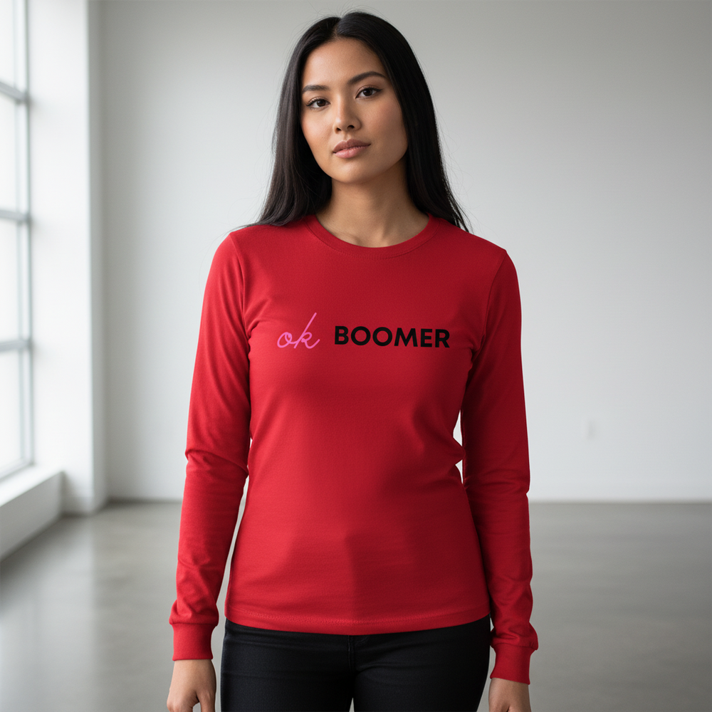 Front-facing model wearing a red long-sleeve shirt reading “ok BOOMER”