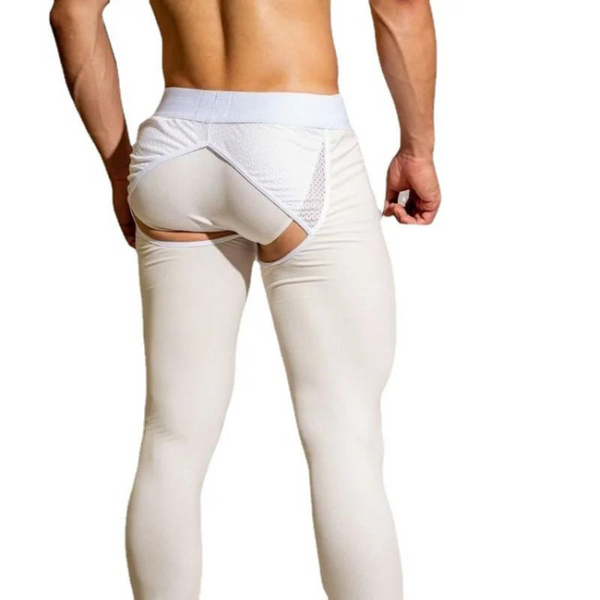 Rear view of a model wearing white leggings with an open-butt cutout and mesh panel
