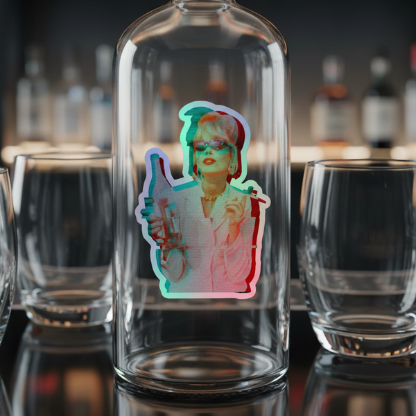 Clear glass bottle with a holographic Patsy Stone Absolutely Fabulous sticker