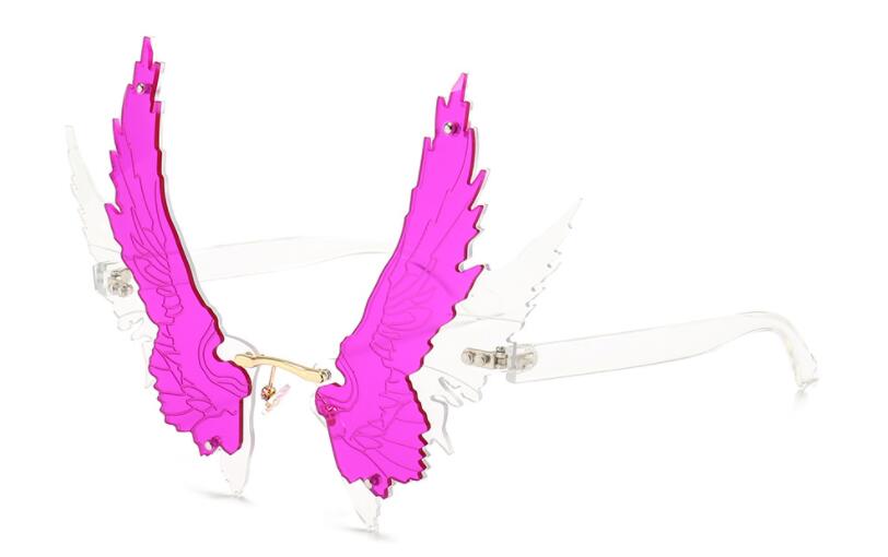 White-framed sunglasses with large bright pink wing-shaped lenses and clear arms