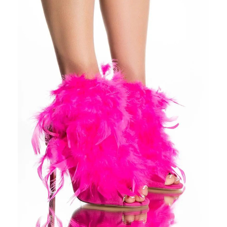 Model wearing hot-pink feather-covered platform heels, shown from the rear and side